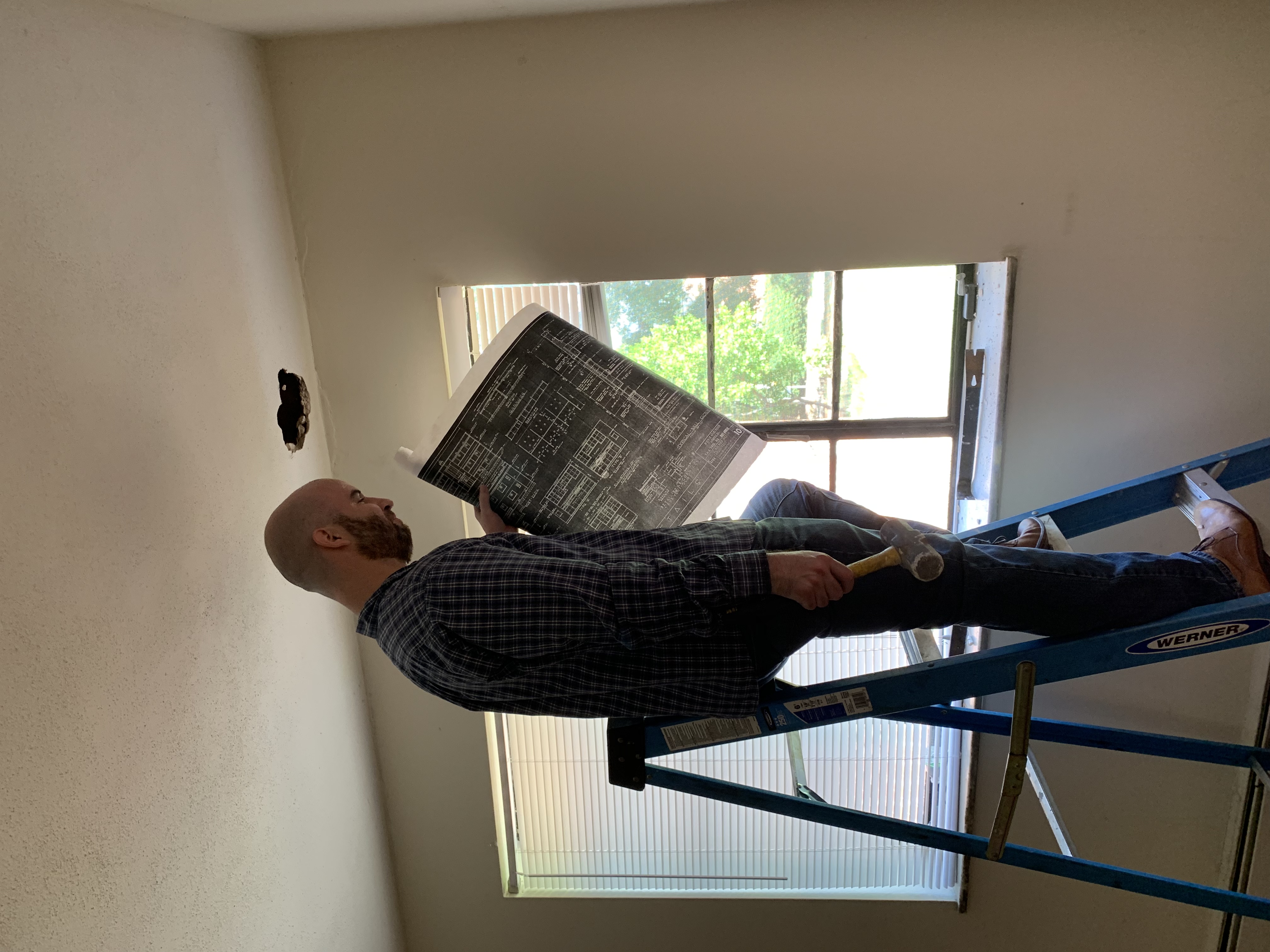 Knocking holes in ceilings.  Just another day in the life.